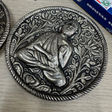 Metal Round 10cm dia Embossed Incense Stick Holder&nbsp;

Design - Buddha Vitarka Mudra hand position meditating