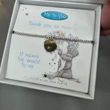 'Me to You' Limited Edition Range - Bracelet Collection;


Quote on the Card - 'Thank you so much It means the world to me'
Silver beaded Bracelet &amp; Gold heart charm
Illustration - Adorable Me to You' Bear holding a bouquet of flowers..