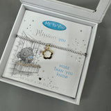 Life Charms the Thoughtful Jewellery Co.
'Me to You' Limited Edition Range - Bracelet Collection;


Quote on the Card - 'Missing you more than you know'
Silver beaded Bracelet &amp; Gold outline flower charm
Illustration - Adorable Me to You' Bear looking out of an open window with flower box..