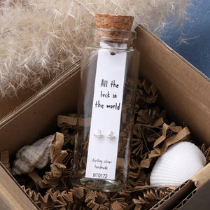 Message in a Bottle Sterling Silver Stud Earrings handmade in Devon
Style - Planet earrings with an inlaid with clear diamante crystal&nbsp;
Quote on the card - 'All the luck in the world'