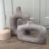Brown/Grey Natural Textured Rough Earth Sculptured Vases
Available in 2 sizes - Wide H17cm &amp; Tall H30.5cm&nbsp;


A natural rustic hand-thrown terracotta brown/grey coloured Sculptured vases with a rough-hewn finish; perfectly imperfect with an earthy and handcrafted qualities.&nbsp; 