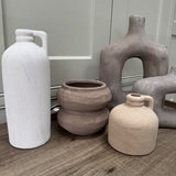 Brown textured earthy bulbous stone Vase