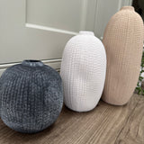 Terracotta rough round small vases with mottled pattern
Available in 3 sizes &amp; colours;
Round Grey/Black H11cm&nbsp;
Slim White H17cm
Tall Slim Light Tan H23.8cm