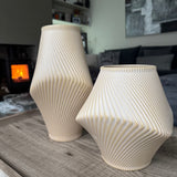 Modern Tan terracotta earthy ribbed vases with a wave effect
Available in 2 sizes - Short H21cm &amp; Tall H31cm&nbsp;