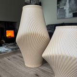 Modern Tan terracotta earthy ribbed vases with a wave effect
Available in 2 sizes - Short H21cm &amp; Tall H31cm&nbsp;