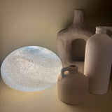 Hand crafted unique high quality glass lamps
Glass Pebble Hand-Blown Flat Round Lamp Dia25cm x H16cm
Design - Sand &amp; Sea / Light blue &amp; Grey colour swirls