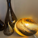 Hand crafted unique high quality glass lamps
Glass Pebble Hand-Blown Flat Round Lamp Dia25cm x H16cm
Design - Black &amp; Orange Swirls&nbsp;