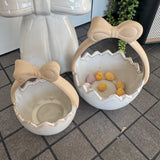 Glazed Ceramic Neutral Easter Egg basket with unglazed bow Handle&nbsp;
Available in 2 sizes; Small 12cm &amp; Large 15cm