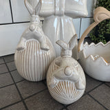 Glazed Neutral Ceramic Rabbit sat on a Easter Egg - 2 sizes