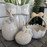 Glazed Neutral Ceramic Rabbit sat on a Easter Egg - 2 sizes