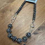 Eliza Gracious quality affordable design led branded costume jewellery

Tigers Eye effect large beads with twin link decoration Short necklace
Colour - Grey