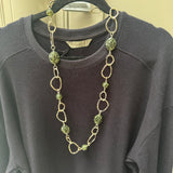 Eliza Gracious quality affordable design led branded costume jewellery

Tigers Eye effect beads mixed with soft gold twin links decoration long necklace
Colour - Green&nbsp;