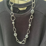 Eliza Gracious quality affordable design led branded costume jewellery

Tigers Eye effect beads mixed with silver twin links decoration long necklace
Colour - Grey