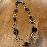 Eliza Gracious quality affordable design led branded costume jewellery

Tigers Eye effect beads mixed with soft gold twin links decoration long necklace
Colour - Green&nbsp;