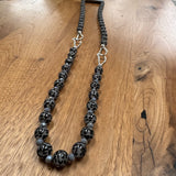 Eliza Gracious quality affordable design led branded costume jewellery

Tigers Eye effect large beads with twin link silver decoration long necklace
Colour - Grey