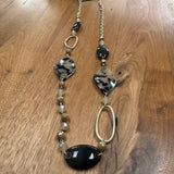 Eliza Gracious quality affordable design led branded costume jewellery

Mix of Tortoiseshell Brown Resin, neutral crystals beads, pale matt gold links and long chain Necklace&nbsp;

New SS26 EG Collection