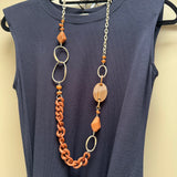 Eliza Gracious quality affordable design led branded costume jewellery

Mix of Brown Resin different size discs &amp; shapes with a chain link and matt gold chain &amp; link long Necklace&nbsp;

New SS26 EG Collection
EN1068