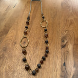 Eliza Gracious quality affordable design led branded costume jewellery

Mix of matt brown &amp; marble tan beads with matt gold links long chain Necklace&nbsp;

New SS26 EG Collection
EN0970