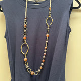 Eliza Gracious quality affordable design led branded costume jewellery

Mix of matt brown &amp; marble tan beads with matt gold links long chain Necklace&nbsp;

New SS26 EG Collection
EN0970