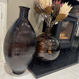Round Recycled Glass Vase H42cm features a distinctive ribbed finish&nbsp;
Colour - Peacon Brown, soft brown hue