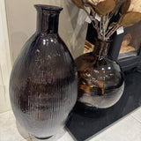 Tall bottle-shaped Recycled Glass Vase H59cm features a distinctive ribbed finish &amp; gently curved lines
Colour - Peacon Brown, soft brown hue