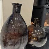 Tall bottle-shaped Recycled Glass Vase H59cm features a distinctive ribbed finish &amp; gently curved lines
Colour - Peacon Brown, soft brown hue