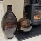Tall bottle-shaped Recycled Glass Vase H59cm features a distinctive ribbed finish &amp; gently curved lines
Colour - Peacon Brown, soft brown hue