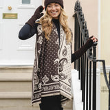 Accessories by Park Lane
Super soft Scarf with reversible design which features an elegant mix of a classic Paisley pattern, micro-dot details, an ornamental border and a delicate fringed trim.
Colour - Dark Brown &amp; Cream&nbsp;