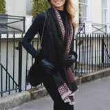 Accessories by Park Lane
Super soft Scarf with leopard print border design and a solid black panel running down the center and a delicate fringed trim.