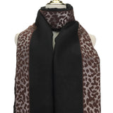 Accessories by Park Lane
Super soft Scarf with leopard print border design and a solid black panel running down the center and a delicate fringed trim.