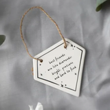 White ceramic hanging diamond shape 8cm with a friendship quote;
'Best friends are like diamonds; bright, precious and hard to find'