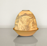 Light Glow - Home; supply the best designs &amp; the highest quality products
White Ceramic&nbsp;Lithophane Oval Dome H10.6cm T-Light Candle Holder&nbsp;
Design - Highland Cows