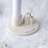 White Ceramic tapered Candlestick Holder with two cuddling Polar Bears&nbsp;
Festive Quote - 'Let it Snow'