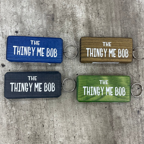 Made in the UK by Giggle Gift Co. Wooden block keyring with white text quote on both sides; 'The Thingy Me Bob' 