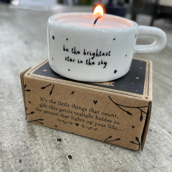 Ceramic T-Light Holder with loving quote: 'Be the brightest star in the sky' Lovely small gift idea for that special someone to show them you are thinking about them in a simple yet beautiful way. Decorated with mini stars all around and a handle at the side. 