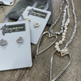 Eliza Gracious Long Freshwater Pearl Necklace with Open Heart Pendant Available in Light Grey or Cream Pearl with matching earrings available