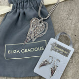 Eliza Gracious - Long Double Heart Necklace | Silver with earrings