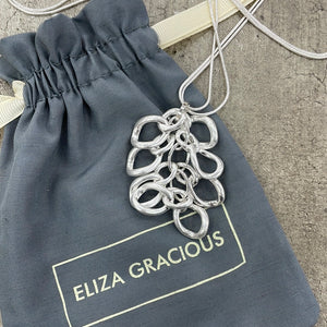 Eliza Gracious quality affordable design led branded costume jewellery.  Bunch of Rings Silver Long Necklace