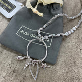Eliza Gracious Long Freshwater Pearl Necklace with Multi-Charm Pendant Available in Light Grey or Cream Pearl