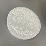 Crystal Selenite Disc Charging Plate 10cm with an etched details of the Tree of Life  This selenite 10cm disc Charging plate cleanses other crystals, you can use this plate to cleanse and charge your collection by placing them directly on the plate.   Alternatively these have been bought as coaster mats!