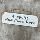 Wooden Hanging Sign - "A spoilt dog lives here"