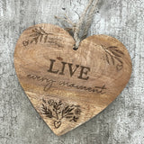 Quotable Hanging Wooden Hearts - 4 quotes Add these rustic hanging hearts to the home with their loving expressions. These 4 assorted hearts each display a different meaningful quote:  'Live every moment'