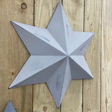 Retreat -Lovely hanging metal wall star in a chic grey. Featuring a rustic, distressed look 60cm 14SS24