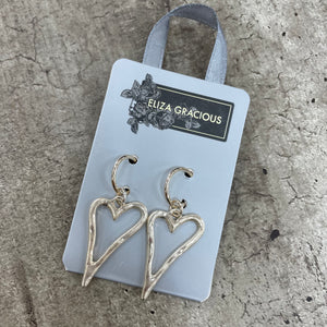 Eliza Gracious - quality affordable design led branded costume jewellery.  Outline Heart Dangly Earrings *Best sellers!* Available in Silver, Matt Silver & Matt Rose  EE0030