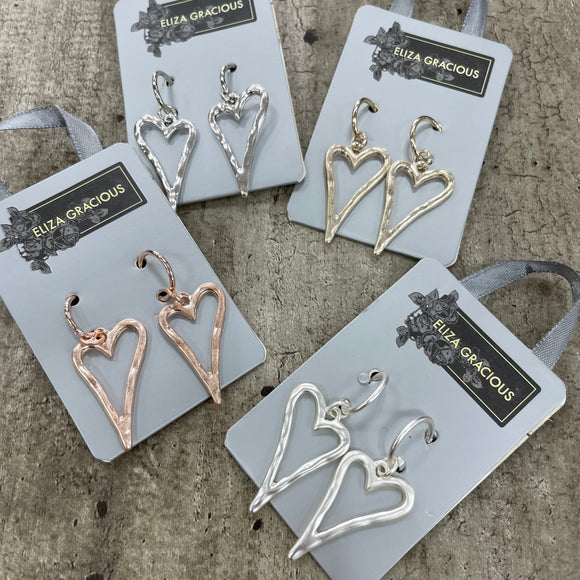 Eliza Gracious - quality affordable design led branded costume jewellery.  Outline Heart Dangly Earrings *Best sellers!* Available in Silver, Matt Silver & Matt Rose  EE0030