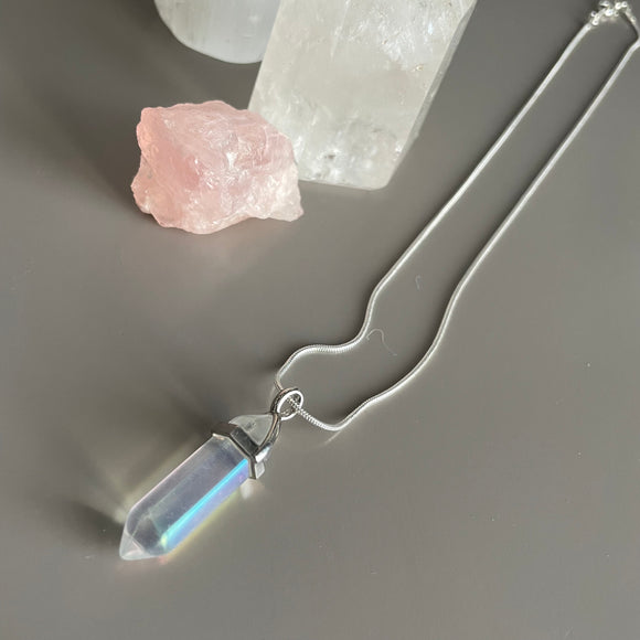 Crystal Point Pendant Necklace - Angel Aura Angel Aura point pendant approx 3.5cm in length and a silver plated delicate chain 22cm in length approx. 