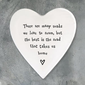 East of India - Porcelain heart coaster with the words 'There are many roads we love to roam, but the best road is the one that takes us home'.
