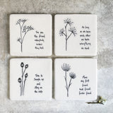 Porcelain square white coaster with the words ‘Happiness is just a biscuit away'. 