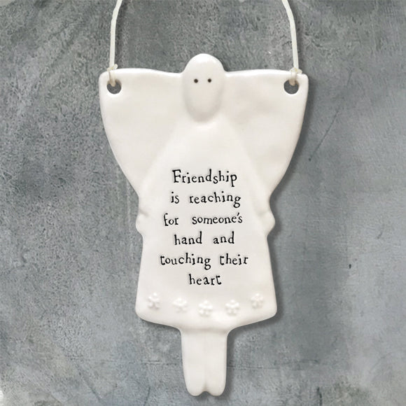 East of India Hanging Porcelain Angel with a meaningful quotes; 'Friendship is reaching for someone's hand and touching their heart' 4059