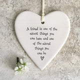 East of India Hanging Porcelain Heart with a meaningful quotes; 'A friend is one of the nicest things you can have and one of the nicest things you can be' 4208